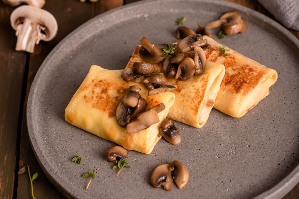 hot pancake with chicken mushrooms and cheese - Блинчики с грибами, картофелем и луком