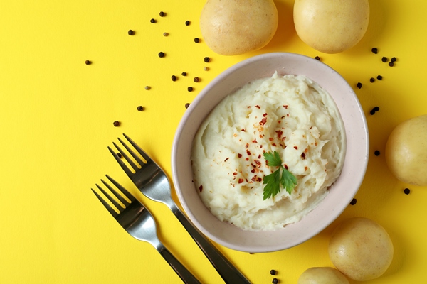 plate of mashed potatoes and ingredients on yellow - Блинчики с грибами, картофелем и луком