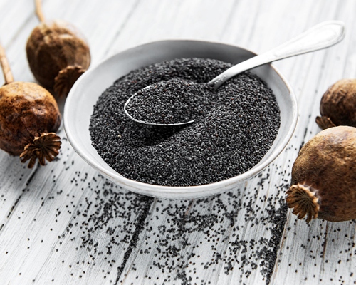 poppy seeds in small bowl on the wooden background - Коливо по-монастырски на пятницу (видео)