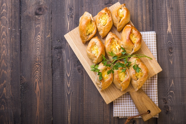 rasstegai pie with fish filling and rice egg traditional meal of russian cuisine 1 - Монастырская кухня: манный мусс с клюквой и расстегаи