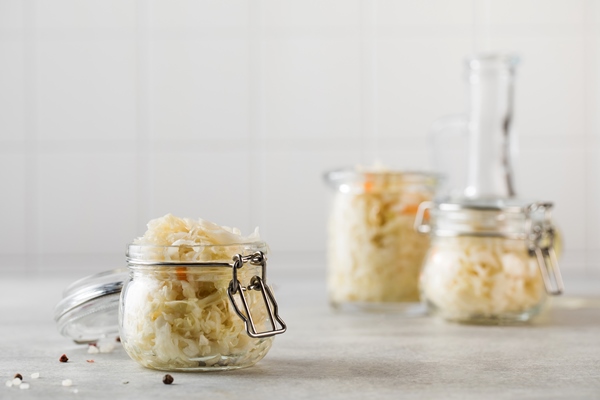 sauerkraut in glass jars fermentation and canning of vegetables copy space - Монастырская кухня: суп из красной фасоли, драники (видео)