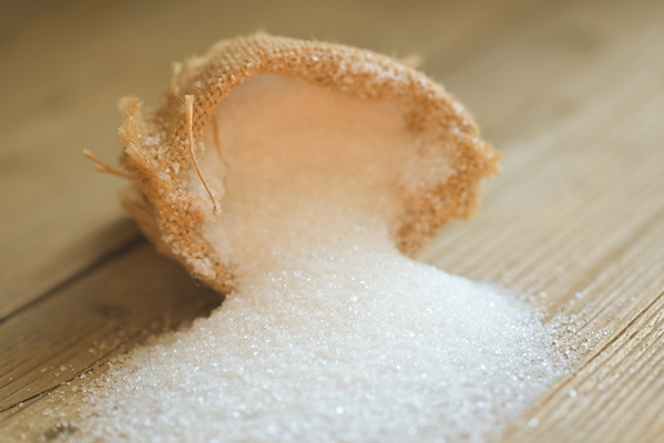 sugar on sack and wooden background white sugar for food and sweets dessert candy heap of sweet sugar crystalline granulated - Сметана, взбитая с сахаром
