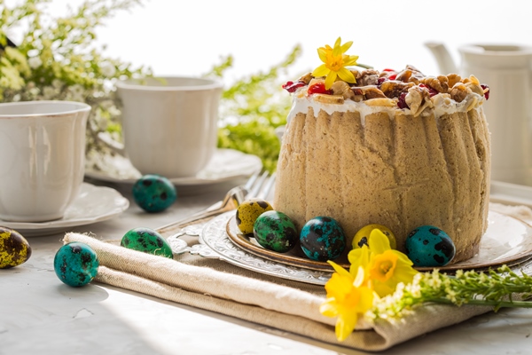 traditional russian easter cottage cheese dessert orthodox paskha on table with kulich cakes flowers colored eggs - Яичная пасха без творога