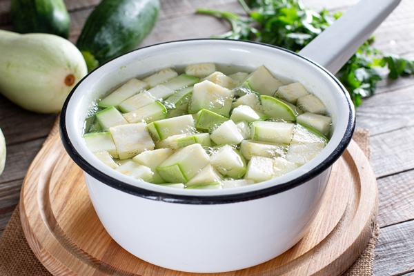 boiled vegetables zucchini blanching frozen food concept - Маринованные консервированные кабачки