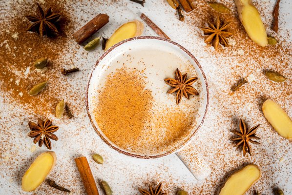 traditional indian masala chai tea with spices cinnamon cardamom anise white top view copyspace - Растительное молоко: виды и свойства
