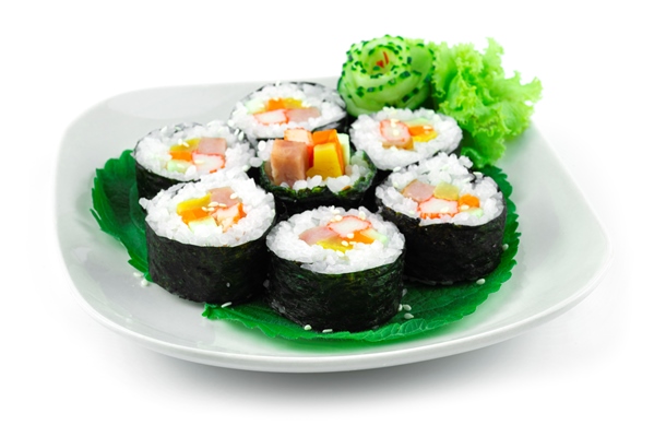 gimbap also spelled kimbap ingredients such as vegetables spam ham that are rolled in gim dried sheets of seaweed is the perfect meal is a korean style homemade street food dish sideview - Съедобные водоросли