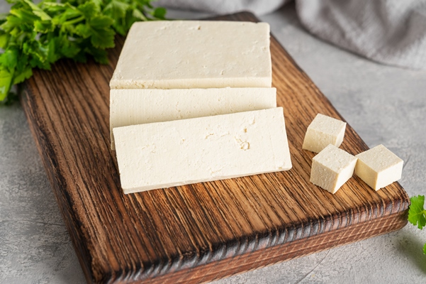 fresh cheese tofu from soybeans with parsley on a board a vegan product copy space - Мисо суп