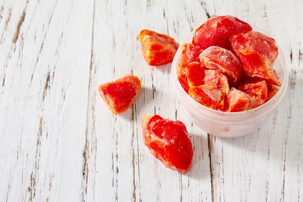 healthy food is frozen food for the winter containers with frozen tomatoes - Турецкая запеканка с кебабом