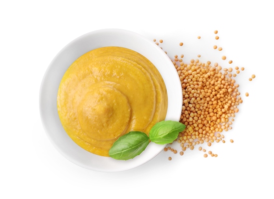 mustard in small bowl with mustard seeds isolated on white - Глостерский соус (английская кухня)