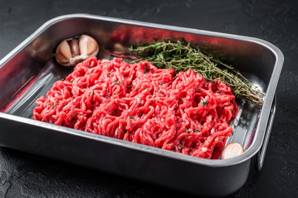 raw beef forcemeat ground meat black background top view - Люля-кебаб