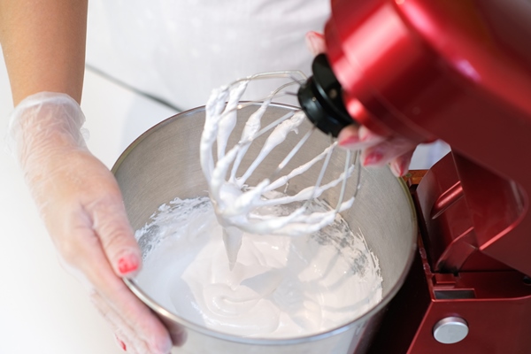 beaten egg whites until frothy whipped egg whites for a meringue red stationary mixer food processor - Венские вафли в духовке