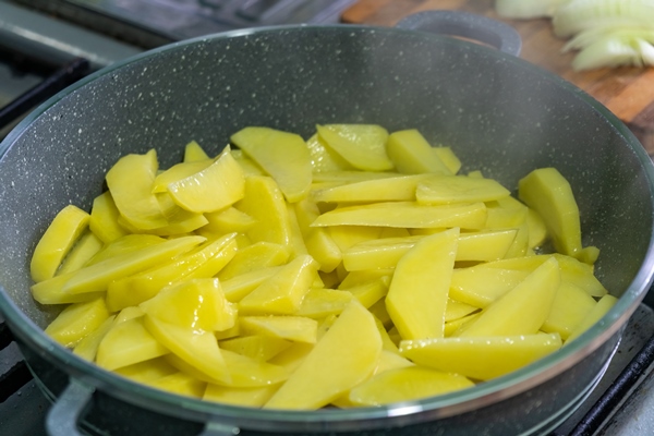 frying pan with french fries appetizing rustic golden potatoes food 1 - Жареный картофель с луком