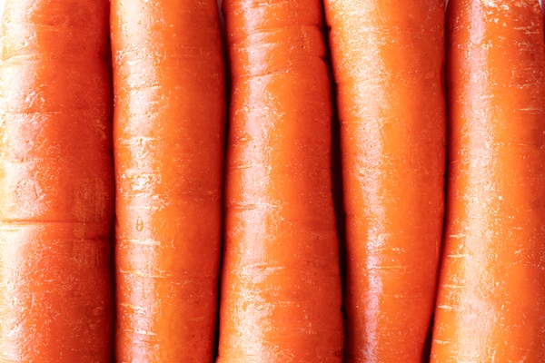 close up texture of carrots - Пшеничная каша в котелке на костре