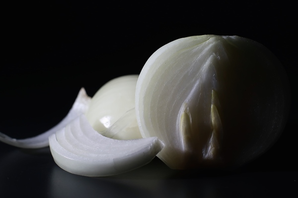 fresh onion bulbs on black background bulb onion is rich in vitamins useful spring - Постный тыквенный суп "Копатыч"
