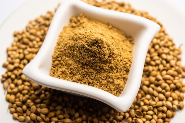 indian spice heap of coriander powder or dhaniya powder or chinese parsley dried seeds selective focus 1 - Бородинский хлеб
