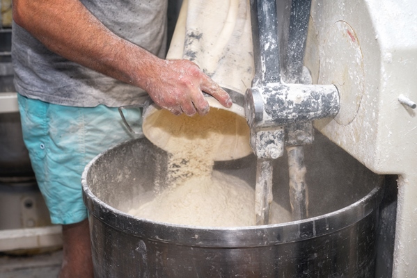 loading flour into an industrial bakery dough - Украинский хлеб
