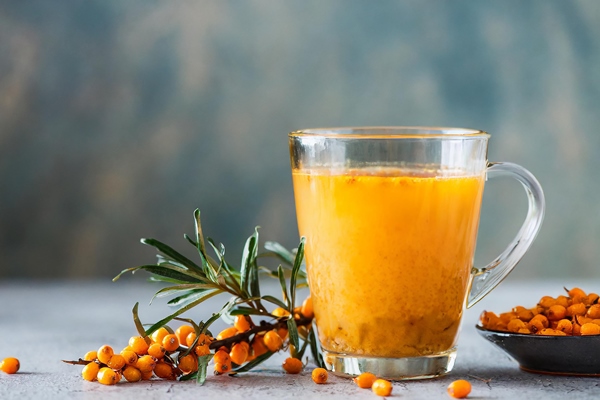 healthy sea buckthorn tea glass cup selective focus 1 - Облепиха в собственном соку