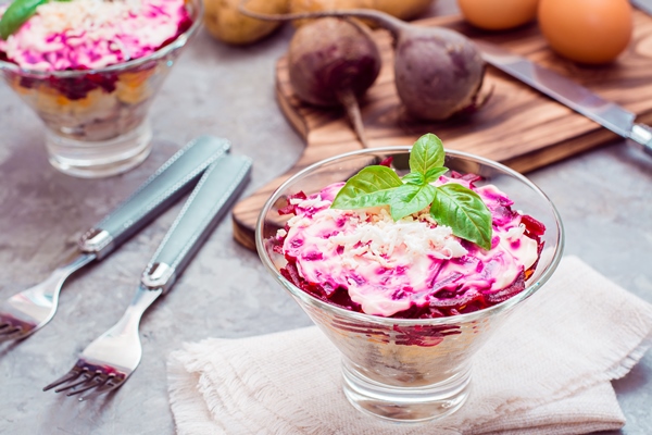 traditional russian appetizer boiled vegetables fish herring fur coat bowls ingredients cooking table russian salad - Грибной салат со свёклой