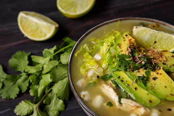 top view appetizing pozole bowl - Треска-пашот в кокосовом молоке с овощами