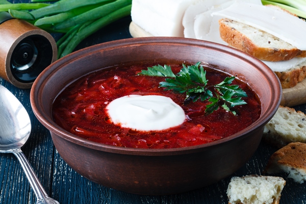 traditional ukrainian russian vegetable borscht soup old wooden surface - Борщ киевский