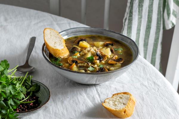 bowl with food table high angle - Грибной суп с маринованным помидором