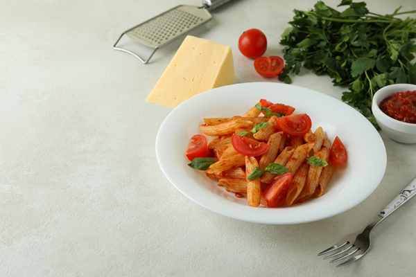 concept tasty food with pasta with tomato sauce ingredients - Макароны в томате