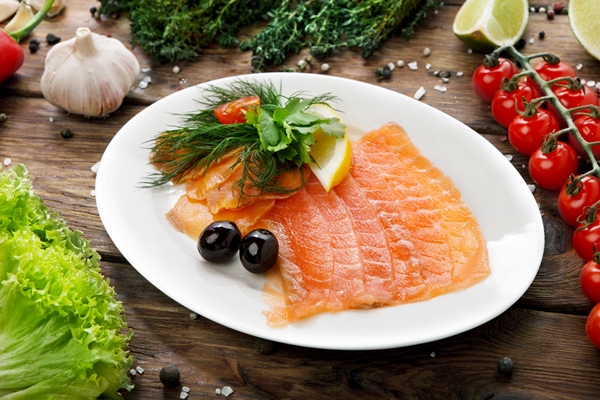 fish salted salmon sliced on a plate - Лучшие рецепты домашней засолки рыбы к Новому году