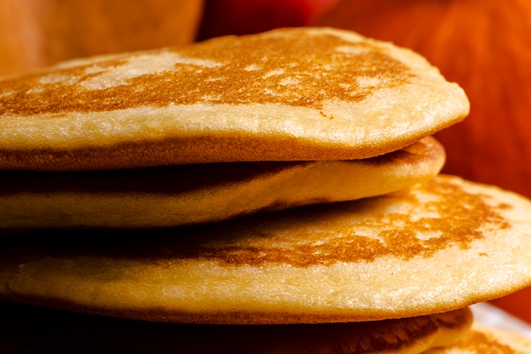 side view assortment with pancakes foreground - Тыквенники