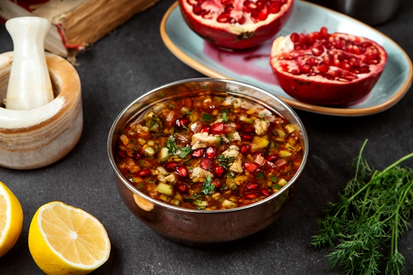 vegetable soup topped with pomegranate - Суп из баранины с гранатом