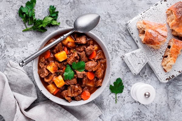 delicious goulash ready dinner - Рагу из говядины с картофелем