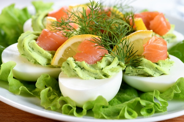 eggs stuffed with avocado salmon lemon perfect appetizer your holiday table - Фаршированные яйца с авокадо