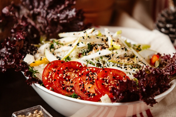 front view caesar salad with chicken tomatoes - Салат из корня сельдерея с копчёным палтусом