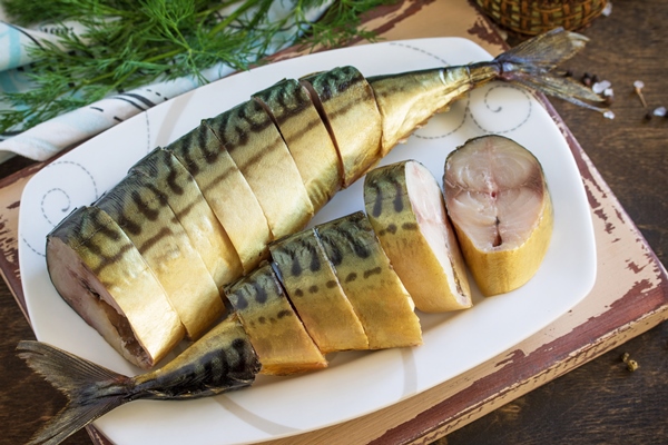 high angle view fish plate table - Скумбрия копчёная