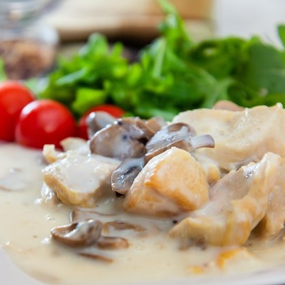 Карп под соусом с шампиньонами