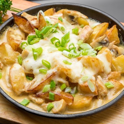 Белые грибы с картофелем и сметаной в духовке